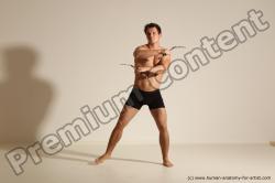 Underwear Fighting with axe Man White Muscular Short Brown Dynamic poses Academic